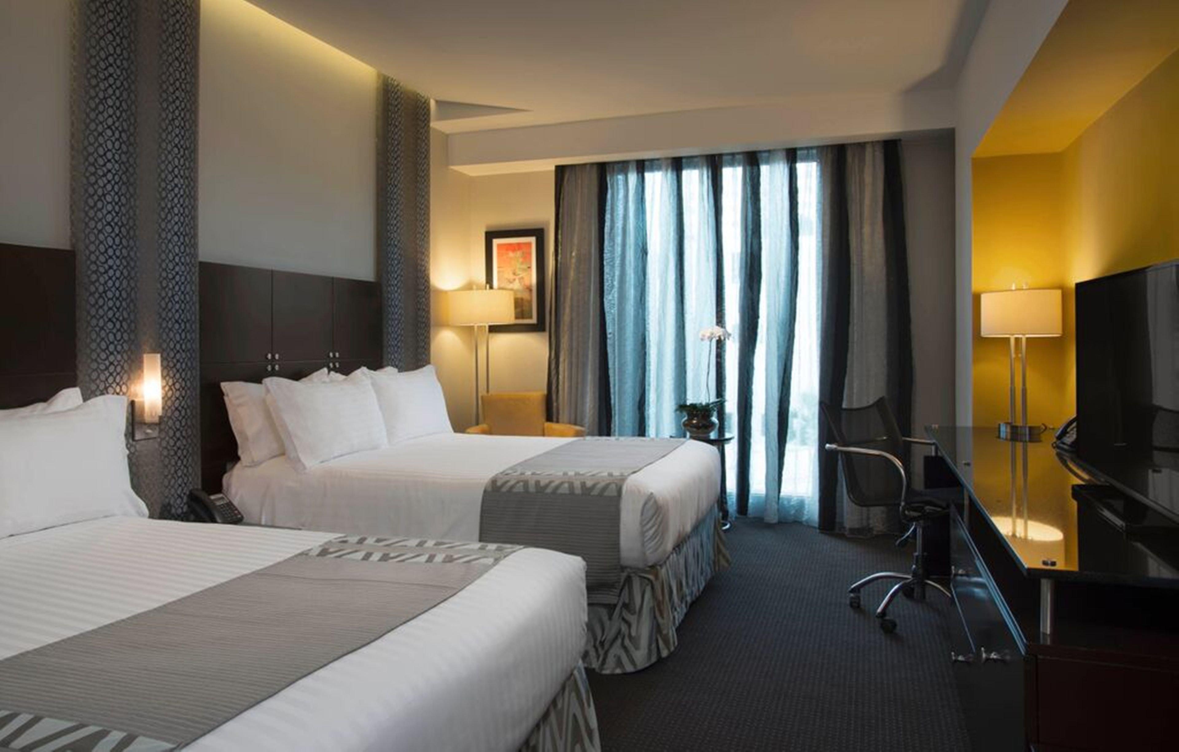 홀리데이 인 산토 도밍고 호텔 앤 스위트 산토도밍고 외부 사진 A room at the hotel